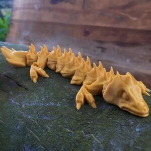 Flexi Lizard is a beautifully designed 3D printable model, perfect for FDM print